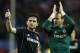 Chelsea's Frank Lampard, left, and Chelsea's Mark Schwarzer greet their fans after the Champions League semifinal first leg soccer match between Atletico Madrid and Chelsea at the Vicente Calderon stadium in Madrid, Spain, Tuesday, April 22, 2014. The match ended in a 0-0 draw. (AP Photo/Andres Kudacki)