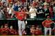 WASHINGTON, DC - APRIL 22: Albert Pujols #5 of the Los Angeles Angels of Anaheim acknowledges the crowd after hitting a two-run home run against the Washington Nationals in the fifth inning at Nationals Park on April 22, 2014 in Washington, DC. The home run home was Albert Pujols' 500th. (Photo by Patrick Smith/Getty Images)