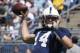 Penn State quarterback Christian Hackenberg (14) during warmups before the Penn State annual Blue-White Game NCAA football scrimmage on Saturday, April 12, 2014 in State College, Pa. (AP Photo/Keith Srakocic)