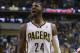 Indiana Pacers' Paul George (24) reacts during the second half in Game 2 of an opening-round NBA basketball playoff series against the Atlanta Hawks Tuesday, April 22, 2014, in Indianapolis. Indiana defeated Atlanta 101-85. (AP Photo/Darron Cummings)