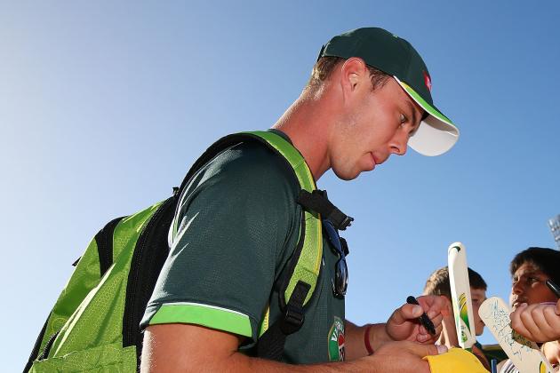 HOBART, AUSTRALIA - JANUARY 29:  Chris Lynn of Australia signs autographs for fans during game one of the International Twenty20 series between Australia and England at Blundstone Arena on January 29, 2014 in Hobart, Australia.  (Photo by Michael Dodge/Getty Images)