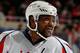 UNIONDALE, NY - APRIL 05: Joel Ward #42 of the Washington Capitals skates against the New York Islanders at Nassau Veterans Memorial Coliseum on April 5, 2014 in Uniondale, New York. The Capitals defeated the Islanders 4-3. (Photo by Mike Stobe/NHLI via Getty Images)