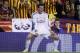 Real's Gareth Bale celebrates scoring his team's 2nd goal during the final of the Copa del Rey between FC Barcelona and Real Madrid at the Mestalla stadium in Valencia, Spain, Wednesday, April 16, 2014. (AP Photo/Alberto Saiz)