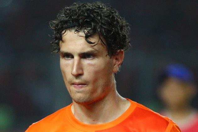 Daryl Janmaat of the Netherlands lines up before his friendly soccer match against Indonesia at Gelora Bung Karno stadium in Jakarta, Indonesia, Friday, June 7, 2013. (AP Photo/Dita Alangkara)