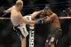 Jan 26, 2013; Chicago, IL, USA; Rampage Jackson (black shorts) fights against Glover Teixeira (black and white shorts) during UFC on FOX 6 at the United Center. Mandatory Credit: David Banks-USA TODAY Sports
