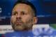 FILE - This is a Monday, March 31, 2014 file photo of Manchester United player Ryan Giggs as he listens to a question during a press conference at Old Trafford Stadium, Manchester, England. Giggs is one of the potential full-time replacements for David Moyes as Manchester United manager after his firing on Tuesday, April 22, 2014. (AP Photo/Jon Super, File)