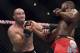 Apr 26, 2014; Baltimore, MD, USA; Jon Jones hits Glover Teixeira with an upper cut during the UFC light heavy weight championship fight at Baltimore Arena. Jones retained the light heavy height championship by defeating Teixeria. Mandatory Credit: Tommy Gilligan-USA TODAY Sports