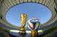 RIO DE JANEIRO, BRAZIL - DECEMBER 03: A general view of Brazuca and the FIFA World Cup Trophy at the Maracana before the adidas Brazuca launch at Parque Lage on December 3, 2013 in Rio de Janeiro, Brazil. Brazuca is the Official Match Ball for the FIFA World Cup 2014 Brazil. Tonight adidas revealed brazuca to the world in the stunning setting of Parque Lage in Rio de Janeiro. The reveal was part of a spectacular light projection supported by global footballers Seedorf, Hernane and FIFA World Cup Winner Cafu. Hundreds of guests and celebrities were treated to this one off experience, which launched the Official FIFA World Cup Ball for Brazil 2014. For more information visit: news.adidas.com/worldcupOMB (Photo by Alexandre Loureiro/Getty Images for adidas)