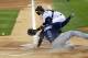 Tampa Bay Rays' Desmond Jennings (8) scores past Chicago White Sox catcher Tyler Flowers off a sacrifice fly by Matt Joyce during the first inning of a baseball game Monday, April 28, 2014, in Chicago. (AP Photo/Charles Rex Arbogast)