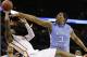 Iowa State guard DeAndre Kane (50) tries to shoot as North Carolina forward Kennedy Meeks (3) defends during the second half of a third-round game in the NCAA college basketball tournament Sunday, March 23, 2014, in San Antonio. (AP Photo/David J. Phillip)