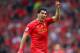 LIVERPOOL, ENGLAND - APRIL 27: Luis Suarez of Liverpool signals during the Barclays Premier League match between Liverpool and Chelsea at Anfield on April 27, 2014 in Liverpool, England. (Photo by Clive Brunskill/Getty Images)