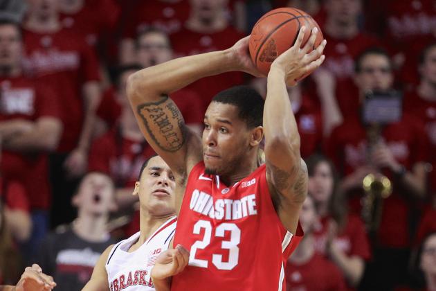 Ohio State center Amir Williams (23) is defended by Nebraska's Tai Webster, rear, in the first half of an NCAA college basketball game in Lincoln, Neb., Monday, Jan. 20, 2014. (AP Photo/Nati Harnik)