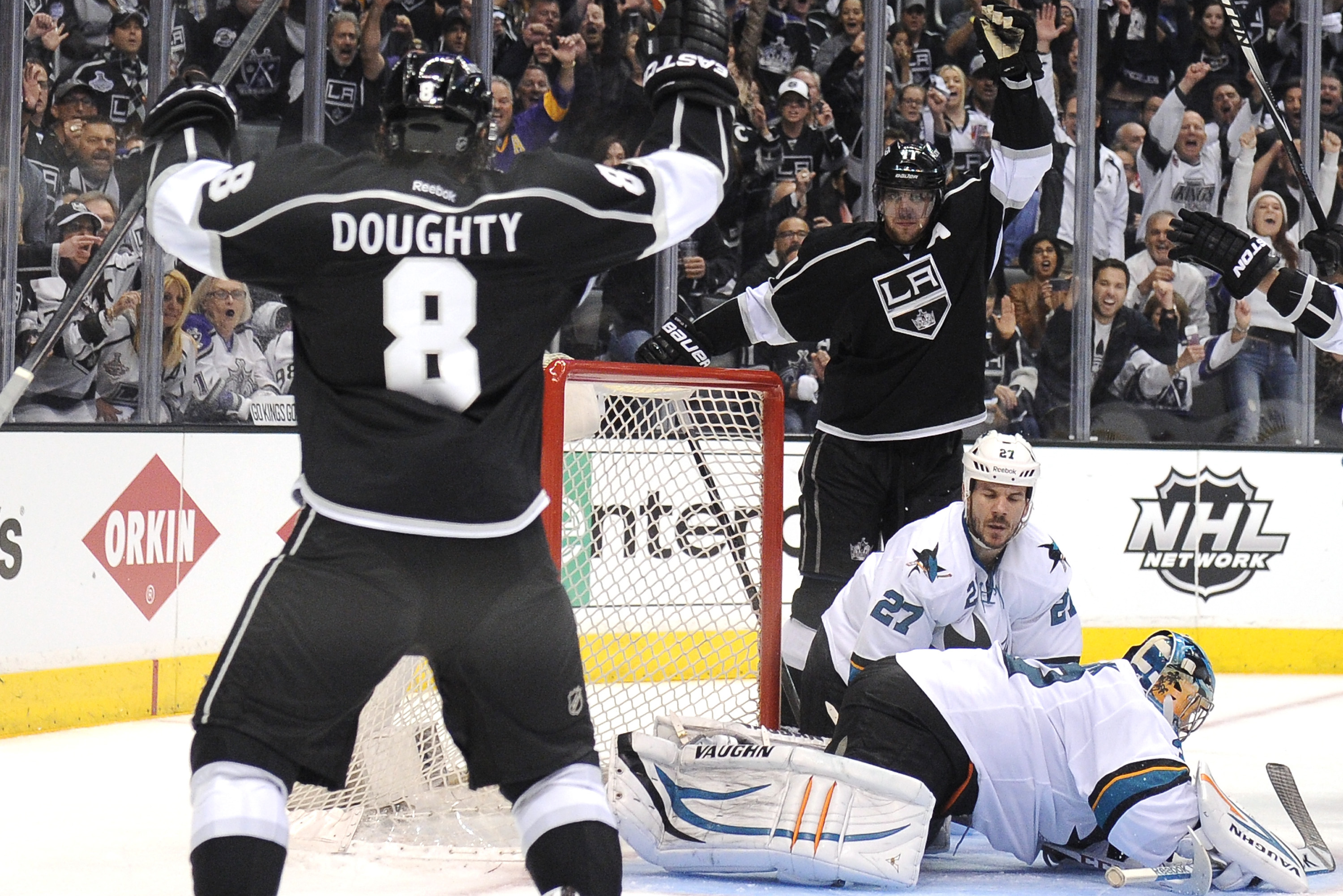 Logan Couture of the San Jose Sharks pursies Drew Doughty of the Los  News Photo - Getty Images