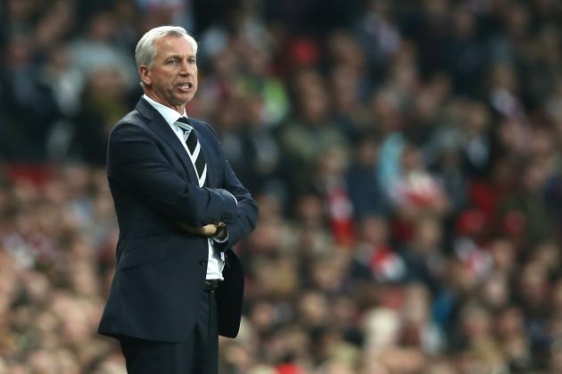 Newcastle's manager Alan Pardew watches his side play Arsenal from the technical area during their English Premier League soccer match between Arsenal and Newcastle United at the Emirates stadium in London, Monday, April  28,  2014. (AP Photo/Alastair Grant)