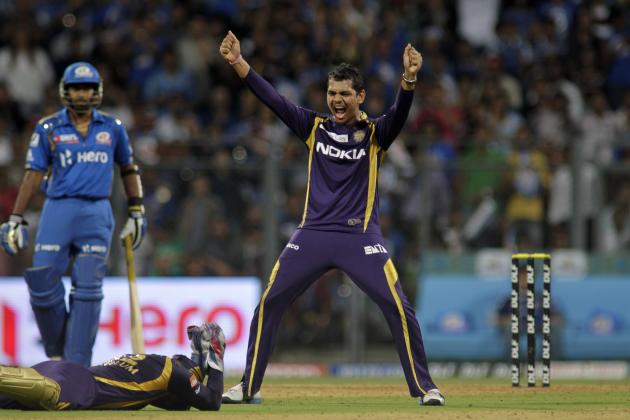 Kolkata Knight Riders Sunil Narine celebrates the dismissal of Mumbai Indians' Rohit Sharma during an Indian Premier League (IPL) cricket match in Mumbai, India, Wednesday, May 16, 2012. (AP Photo/ Rajanish Kakade)