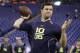 Alabama quarterback AJ McCarron throws during a drill at the NFL football scouting combine in Indianapolis, Sunday, Feb. 23, 2014. (AP Photo/Michael Conroy)