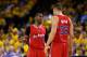 OAKLAND, CA - MAY 01: Blake Griffin #32 talks to Chris Paul #3 of the Los Angeles Clippers during their game against the Golden State Warriors in Game Six of the Western Conference Quarterfinals during the 2014 NBA Playoffs at ORACLE Arena on May 1, 2014 in Oakland, California. NOTE TO USER: User expressly acknowledges and agrees that, by downloading and or using this photograph, User is consenting to the terms and conditions of the Getty Images License Agreement. (Photo by Ezra Shaw/Getty Images)
