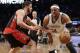 Toronto Raptors' Greivis Vasquez defends Brooklyn Nets' Paul Pierce (34) during the second half of Game 3 of an NBA basketball first-round playoff series Friday, April 25, 2014, in New York. The Nets won 102-98. (AP Photo/Frank Franklin II)