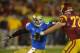 ADVANCE FOR WEEKEND EDITIONS, MAY 3-4 - FILE - In this Nov. 30, 2013, file photo, UCLA linebacker Anthony Barr, left, tries to get by Southern California offensive tackle Chad Wheeler during the first half of an NCAA college football game in Los Angeles. Barr moved from offense to defense after two years in college and finished with 23 1/2 sacks in two seasons playing outside linebacker in 3-4 defense. He is a top prospect in the upcoming NFL draft. (AP Photo/Mark J. Terrill, File)