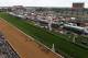 LOUISVILLE, KY - MAY 02: Tiz Windy #2 leads Handmade #1 and Flipcup #3 across the finish line to win the 3rd race ahead of the 140th Kentucky Oaks at Churchill Downs on May 2, 2014 in Louisville, Kentucky. (Photo by Jamie Squire/Getty Images)