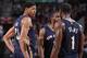 Anthony Davis (left), Darius Evans (middle) and Tyreke Evans huddle up.