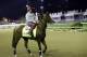 Exercise rider William Delgado takes Kentucky Derby entrant California Chrome for a morning workout during a morning workout at Churchill Downs Friday, May 2, 2014, in Louisville, Ky. (AP Photo/Morry Gash)