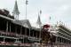 LOUISVILLE, KY - MAY 02: Untapable #13, ridden by Rosie Napravnik, crosses the finish line to win the 140th running of the Kentucky Oaks at Churchill Downs on May 2, 2014 in Louisville, Kentucky. (Photo by Rob Carr/Getty Images)