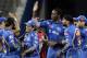Mumbai Indians’ Kieron Pollard, center right, Sachin Tendulkar, center left, and Harbhajan Singh, second right, celebrate the dismissal of Kolkata Knight Riders’ Gautam Gambhir during an Indian Premier League (IPL) cricket match in Mumbai, India, Wednesday, May 16, 2012. (AP Photo/Rajanish Kakade)