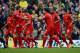 NORWICH, ENGLAND - APRIL 20: Steven Gerrard of Liverpool congratulates Luis Suarez of Liverpool on scoring their second goal during the Barclays Premier League match between Norwich City and Liverpool at Carrow Road on April 20, 2014 in Norwich, England. (Photo by Michael Regan/Getty Images)