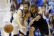 Dallas Mavericks' Jose Calderon, left, of Spain, and San Antonio Spurs' Tony Parker, of France, chase after a loose ball in the first half of Game 6 of an NBA basketball first-round playoff series on Friday, May 2, 2014, in Dallas. (AP Photo/Tony Gutierrez)