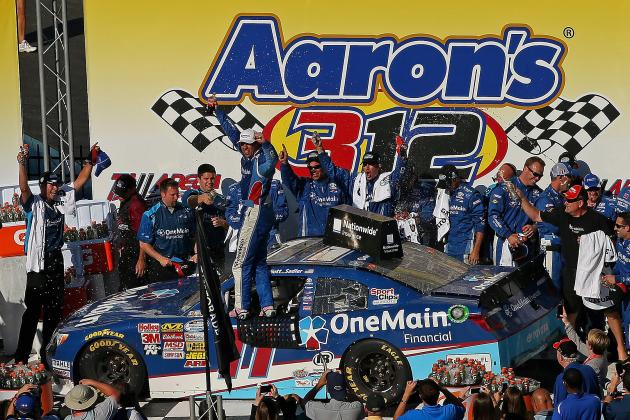 TALLADEGA, AL - MAY 03: Elliott Sadler, driver of the #11 OneMain Financial Toyota, celebrates in Victory Lane after winning the NASCAR Nationwide Series Aaron's 312 at Talladega Superspeedway on May 3, 2014 in Talladega, Alabama. (Photo by Mike Ehrmann/Getty Images)