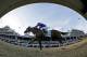 In this image taken with a fisheye lens, jockey Victor Espinoza rides California Chrome to win the 140th running of the Kentucky Derby horse race at Churchill Downs Saturday, May 3, 2014, in Louisville, Ky. (AP Photo/Matt Slocum)