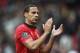 MANCHESTER, ENGLAND - APRIL 26: Rio Ferdinand of Manchester United applauds the fans after the Barclays Premier League match between Manchester United and Norwich City at Old Trafford on April 26, 2014 in Manchester, England. (Photo by Laurence Griffiths/Getty Images)