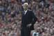 Arsenal's manager Arsene Wenger watches his team play against West Bromwich Albion during their English Premier League soccer match at Emirates Stadium in London, Sunday, May 4, 2014. (AP Photo / Sang Tan)