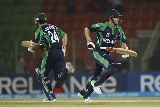 Ireland's Ed Joyce, left, and captain William Porterfield run between the wickets during their ICC Twenty20 Cricket World Cup match against United Arab Emirates in Sylhet, Bangladesh, Wednesday, March 19, 2014. (AP Photo/A.M. Ahad)