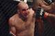 Apr 26, 2014; Baltimore, MD, USA; A cut opens up over the eye of Glover Teixeira during the UFC light heavy weight championship fight against Jon Jones at Baltimore Arena. Jones retained the light heavy height championship by defeating Teixeria. Mandatory Credit: Tommy Gilligan-USA TODAY Sports