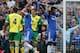 Chelsea's Willian, right, reacts after a foul on his teammate Eden Hazard, by Norwich's Ryan Bennett during their English Premier League soccer match between Chelsea and Norwich City at Stamford Bridge stadium in London Sunday, May 4, 2014. (AP Photo/Alastair Grant)