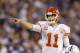 Kansas City Chiefs' Alex Smith (11) calls a play during the second half of an NFL wild-card playoff football game against the Indianapolis Colts Saturday, Jan. 4, 2014, in Indianapolis. (AP Photo/Michael Conroy)