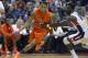 Clemson forward K.J. McDaniels (32) drives past Gonzaga forward Guy Landry Edi (10) during the second half of an NCAA college basketball game at the Old Spice Classic in Kissimmee, Fla., Thursday, Nov. 22, 2012.(AP Photo/Phelan M. Ebenhack)