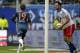 Hamburg's Heiko Westermann, right, reacts as Bayern's Mario Goetze, left passes the goal to celebrate scoring his side's first goal during the German Bundesliga soccer match between Hamburger SV and FC Bayern Munich in Hamburg, Germany, Saturday, May 3, 2014. (AP Photo/Michael Sohn)