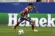 Atletico's Diego Costa runs with the ball during in semifinal, 1st leg Champions League soccer match between Atletico Madrid and Chelsea at the Vicente Calderon stadium in Madrid, Spain, Tuesday, April 22, 2014 .(AP Photo/Paul White)