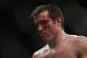 Chael Sonnen stands during a UFC mixed martial arts match against Anderson Silva in Oakland, California, Saturday, August 7, 2010. Silva won by submission in the fifth round to retain the championship. (AP Photo/Jeff Chiu)