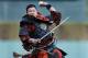 John Truong, wearing a “Samurai warrior” outfit, throws out a ceremonial pitch before the Detroit Tigers and Houston Astros baseball game in Detroit, Tuesday, May 6, 2014. (AP Photo/Paul Sancya)