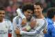 Real's Cristiano Ronaldo, right, and Pepe celebrate after winning the Champions League semifinal second leg soccer match between Bayern Munich and Real Madrid at the Allianz Arena in Munich, southern Germany, Tuesday, April 29, 2014. (AP Photo/Kerstin Joensson)
