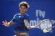 Rafael Nadal returns the ball to Nicolas Almagro during the Barcelona open tennis in Barcelona, Spain, Friday, April 25, 2014. (AP Photo/Manu Fernandez)