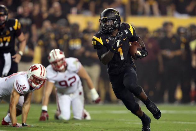 TEMPE, AZ - SEPTEMBER 14:  Running back Marion Grice #1 of the Arizona State Sun Devils rushes the football against the Wisconsin Badgers during the college football game at Sun Devil Stadium on September 14, 2013 in Tempe, Arizona.  (Photo by Christian Petersen/Getty Images)
