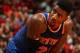 MIAMI, FL - April 6: Iman Shumpert #21 of the New York Knicks looks on during the game against the Miami Heat at the American Airlines Arena in Miami, Florida on April 6, 2014. NOTE TO USER: User expressly acknowledges and agrees that, by downloading and/or using this photograph, user is consenting to the terms and conditions of the Getty Images License Agreement. Mandatory copyright notice: Copyright NBAE 2014 (Photo by Issac Baldizon/NBAE via Getty Images)