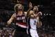 May 8, 2014; San Antonio, TX, USA; Portland Trail Blazers center Robin Lopez (42) and San Antonio Spurs forward Tim Duncan (21) battle for rebounding position in game two of the second round of the 2014 NBA Playoffs at AT&T Center. Mandatory Credit: Soobum Im-USA TODAY Sports