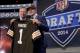 Texas A&M quarterback Johnny Manziel poses with NFL commissioner Roger Goodell after being selected by the Cleveland Browns as the 22nd pick in the first round of the 2014 NFL Draft, Thursday, May 8, 2014, in New York. (AP Photo/Craig Ruttle)