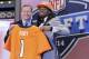 Ohio State cornerback Bradley Roby poses with NFL commissioner Roger Goodell after being selected by the Denver Broncos as the 31st pick in the first round of the 2014 NFL Draft, Thursday, May 8, 2014, in New York. (AP Photo/Craig Ruttle)